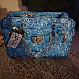 Bebe Blue Crossbody Bag with Gold Accents
